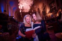 Guests enjoying the treasures of the Library during the event.